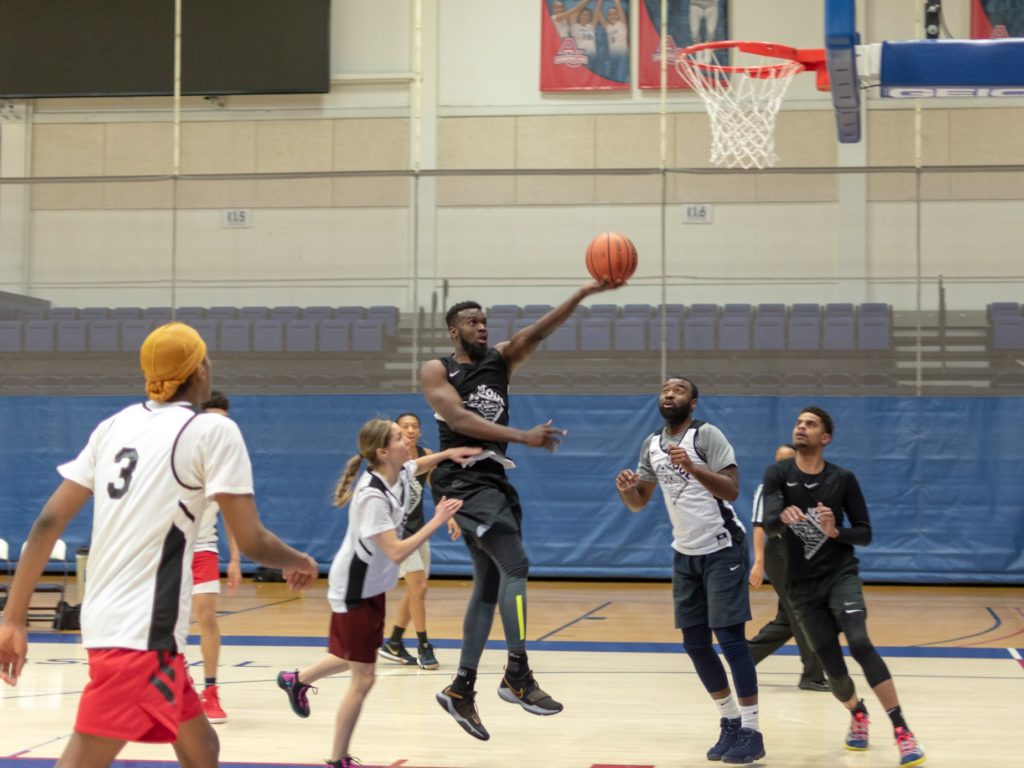 Action shot of a basket player making a layup