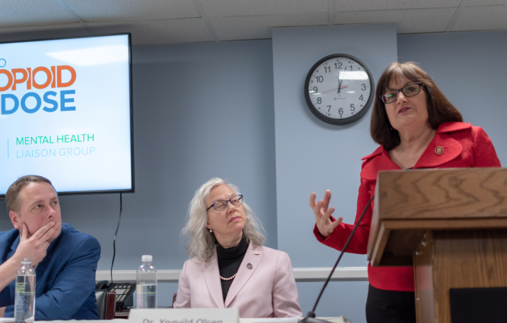 A United States Congresswoman addresses the event from the podium