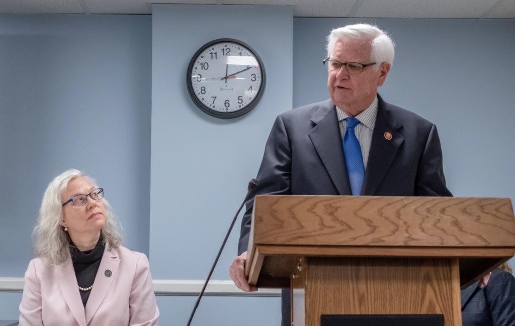 A United States Congressman addresses the event from the podium