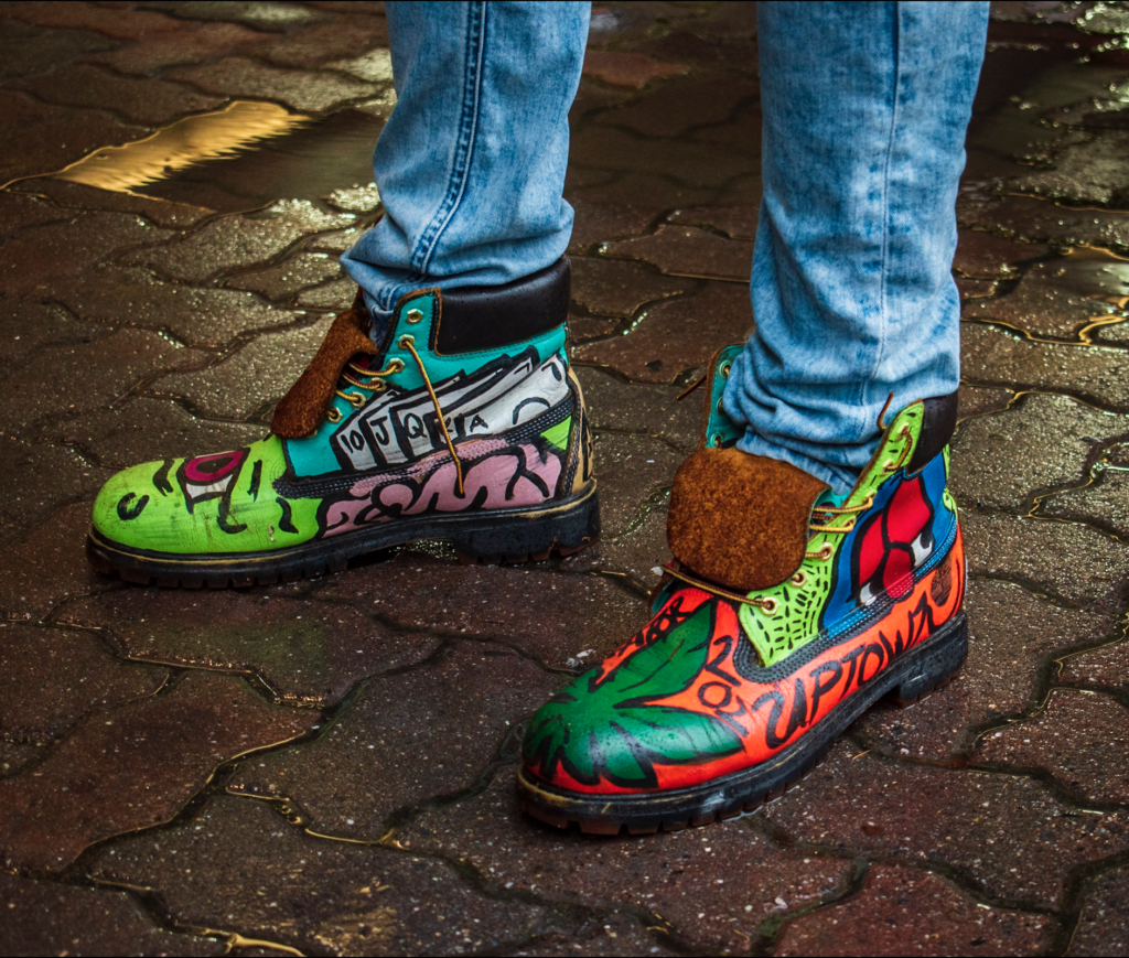 A closeup photograph of brightly-colored hand painted shoes