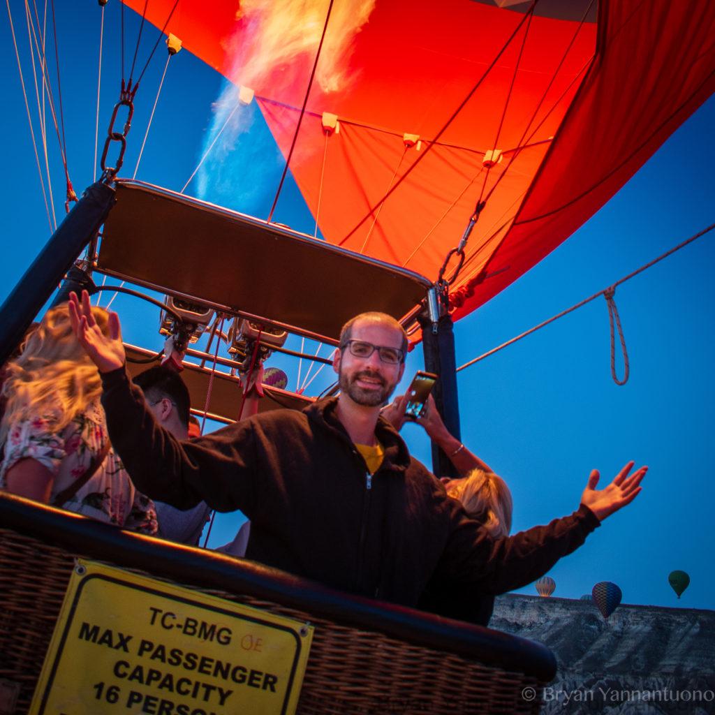 Travel photography - Bryan rides a hot air balloon to see the sun rise at dawn over Cappadocia, Turkey 